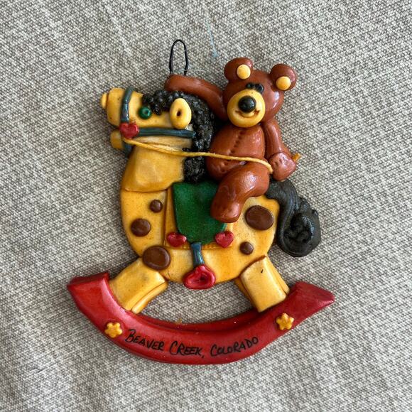 Vintage Beaver Creek, CO Bear on Rocking Horse Clay Christmas Ornament - Picture 1 of 3